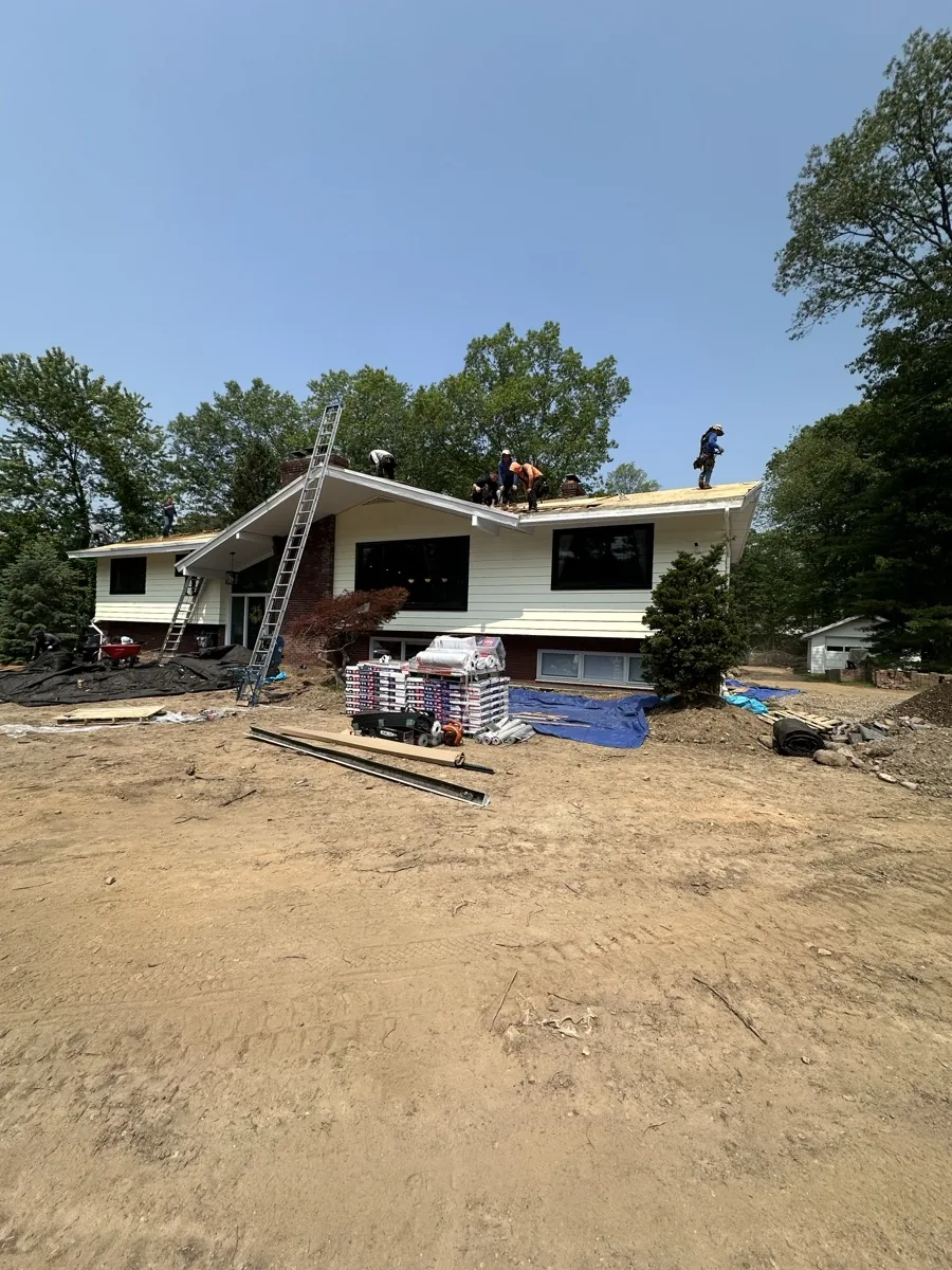Four Seasons crew working on a roof replacement at a North Jersey home