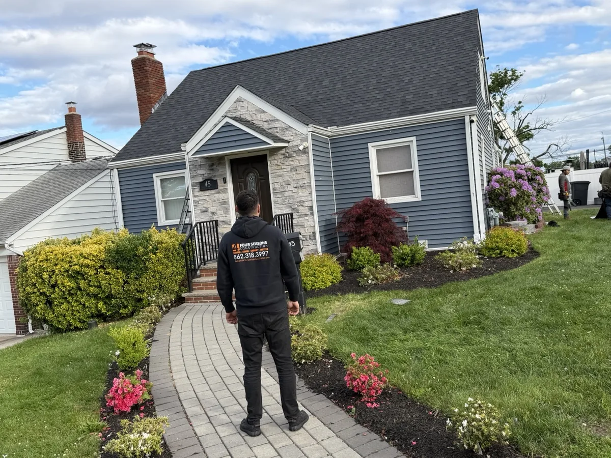 A Four Seasons team member arriving at a North Jersey home for a free inspection